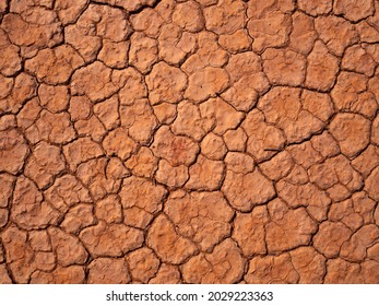 Cracked Red Earth Soil In Drought Affected Red Centre Outback Australia.