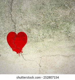 Cracked Red Heart On Concrete Wall