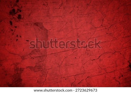 Cracked Red Wall Texture With Deep Fissures And Subtle Shadows For Background Design