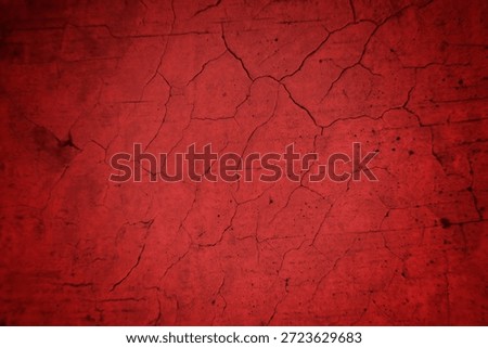 Cracked Red Wall Texture With Deep Fissures And Subtle Shadows For Background Design
