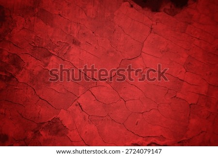 Cracked Red Wall Texture With Deep Fissures And Subtle Shadows For Background Design