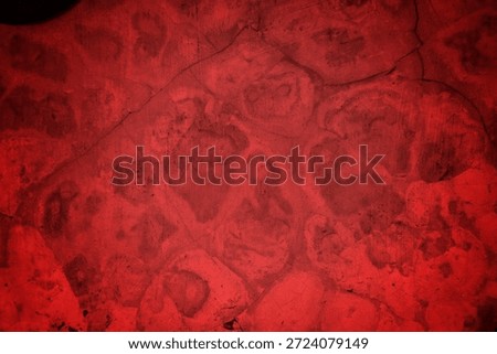 Cracked Red Wall Texture With Deep Fissures And Subtle Shadows For Background Design