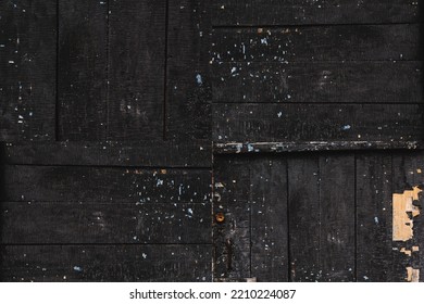 Cracked Surface Of Burnt Black Wood Close-up.