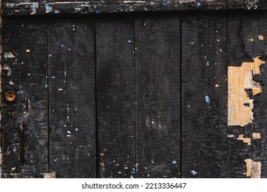 Cracked Surface Of Burnt Black Wood Close-up.