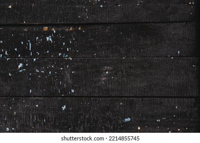 Cracked Surface Of Burnt Black Wood Close-up.