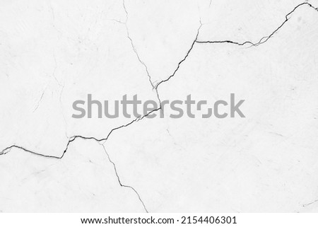 Cracked wall texture grunge damage stain background. Grey dirty old crack broken concrete wall, monochrome, black and white