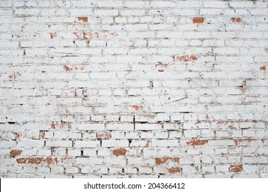 Cracked white grunge brick wall textured background stained old stucco aged paint grungy rusty blocks - Shutterstock ID 204366412