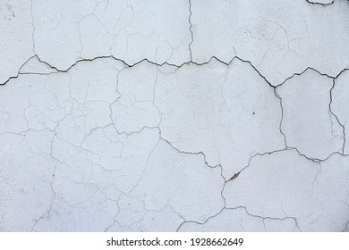 Cracked white old wall background. Horizontal image