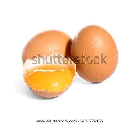 Image, Stock Photo Raw brown chicken eggs in a paper cardboard container on a black background, top view