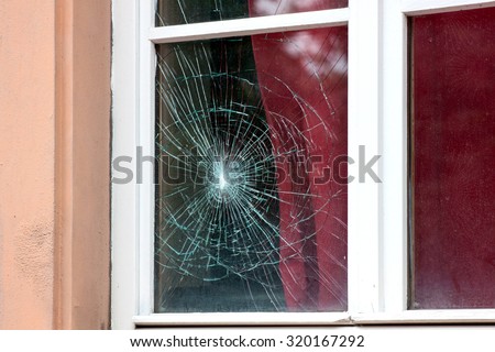 Cracked window in the old house