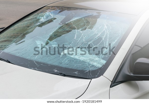 Cracked windshield of the\
car