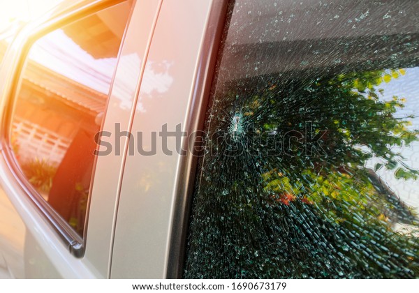 Cracked windshield car\
with copy space