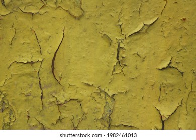 Cracked Yellow Wall. Abstract Structure.