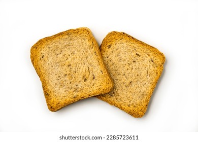 Crackers of dried rye bread on white background. Crunchy rusk or toast for healthy life