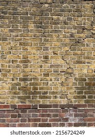 Cracking Aged Brick Wall With Clean Grout
