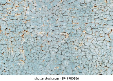 Crackle paint texture. Blue  grunge pattern of natural oil paint crackle. Cool texture of cracks, stains, scratches, splash, etc for print and design.