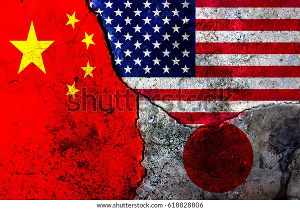 Cracks in the wall.\
Flags: USA, China, Japan