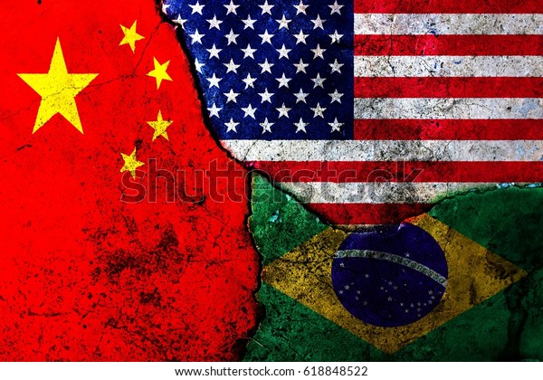 Cracks in the\
wall. Flags: USA, China,\
Brazil