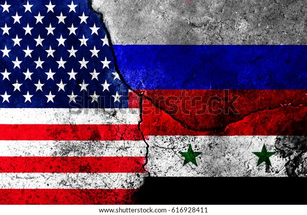 Cracks in the\
wall. Flags: USA, Russia,\
Syria