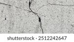 Cracks in walls can result from settling, temperature changes, or structural damage. They may indicate potential issues with the building