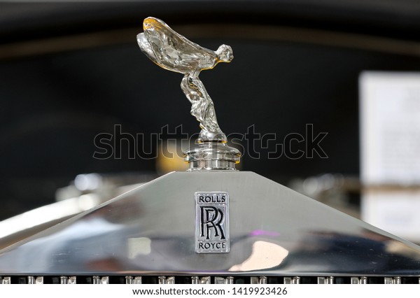 Cracow, Poland - May 18, 2019: Rolls-Royce\
metallic logo closeup on Rolls-Royce car displayed at Moto Show in\
Cracow Poland. Exhibitors present  most interesting aspects of the\
automotive industry.