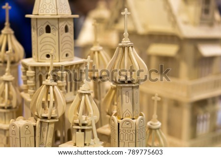 craft, art, handmade concept. close up of extremelly popular wooden construction set, it composes one of the finest russian sightseeing and architecture monument cathedral of vasily the blessed