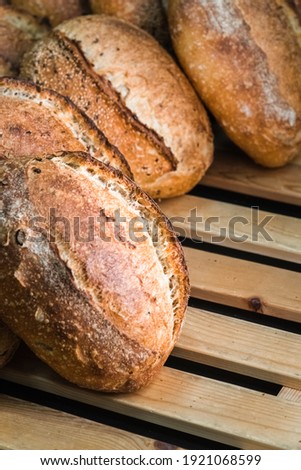 Craft bread on the table at the bakery. The concept of small industries and healthy food