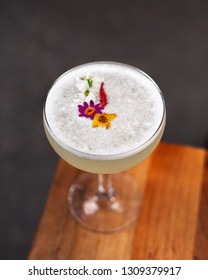 Craft Cocktail With Flower Garnish
