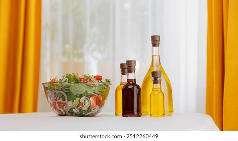 Craft extra virgin set oil of sunflower, olive in glass bottles for dressing vegetable salad on background of kitchen, light. - Powered by Shutterstock