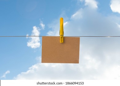 Craft Giftcard On Blue Sky Background. Top View. Place For Inscription. Advertising. Mockup