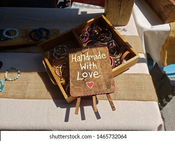 Craft handmade with love display in a Byward Market sales booth downtown Ottawa Ontario Canada.