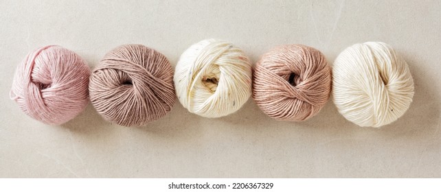 Craft Hobby Background With Yarn In Natural Colors. Recomforting Hobby To Reduce Stress For Cold Fall And Winter Weather. Mock Up, Copy Space, Top View