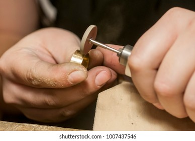 Craft jewelery making. Ring polishing. Macro shot. - Shutterstock ID 1007437546
