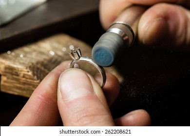 Craft jewelery making. Ring polishing. Macro shot.