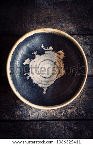 Similar – empty old soup plate with spoon on old wooden background