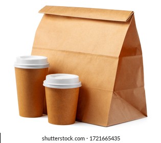 Craft Paper Bag And Coffee To Go Cups On White Background Close Up