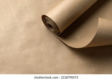Craft paper roll on paper background with copy space