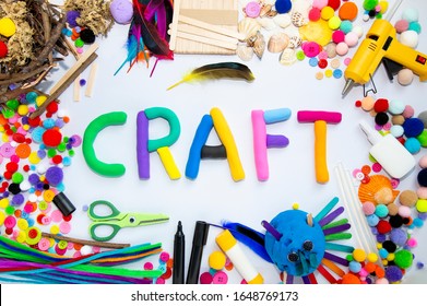 craft sign with various art and craft supplies, play dough letters