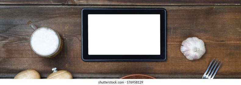  crafting a beer and tablet computer - Powered by Shutterstock