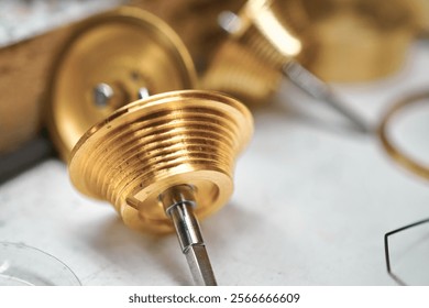 Crafting precision with intricate details of a conical drum chronometer in a workshop setting - Powered by Shutterstock