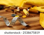 Crafting tools and materials arranged on a wooden table ready for sewing and creative projects