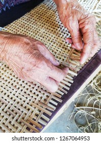 Crafts of folk wisdom made with bamboo hand skin fingers Basketry crossed