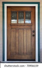 Craftsman Deco Style Window In Mission Style Stained Wood Door With Green And White Trip