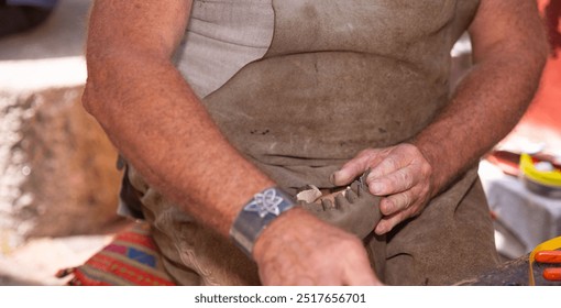 Craftsman, hands carving wood, detailed view, traditional work, handcrafted art, close-up, woodcarving, artisan, woodworking concept, artisanal process, craftsmanship displayed - Powered by Shutterstock