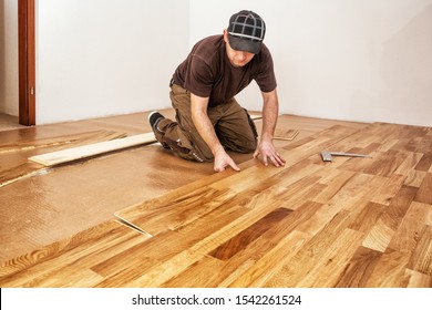 Craftsman Installing Engineered Click System Oak Wood Flooring