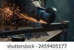 Craftsman in protective gloves working with grinder at industrial plant, man grinding iron detail, sparks flying around.