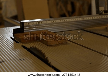 Craftsperson Assembling Crosscut Device Using Woodworking Tools On Wellused Work Table