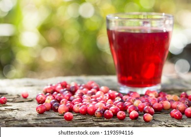 Cranberries And Cranberry Juice In A Glass.