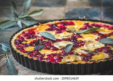 Cranberry Goat Cheese Tart With Sage On Rustic Blue Background