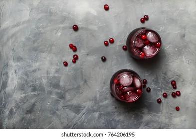 Cranberry Juice In Glass On Gray Stone Background, Top View